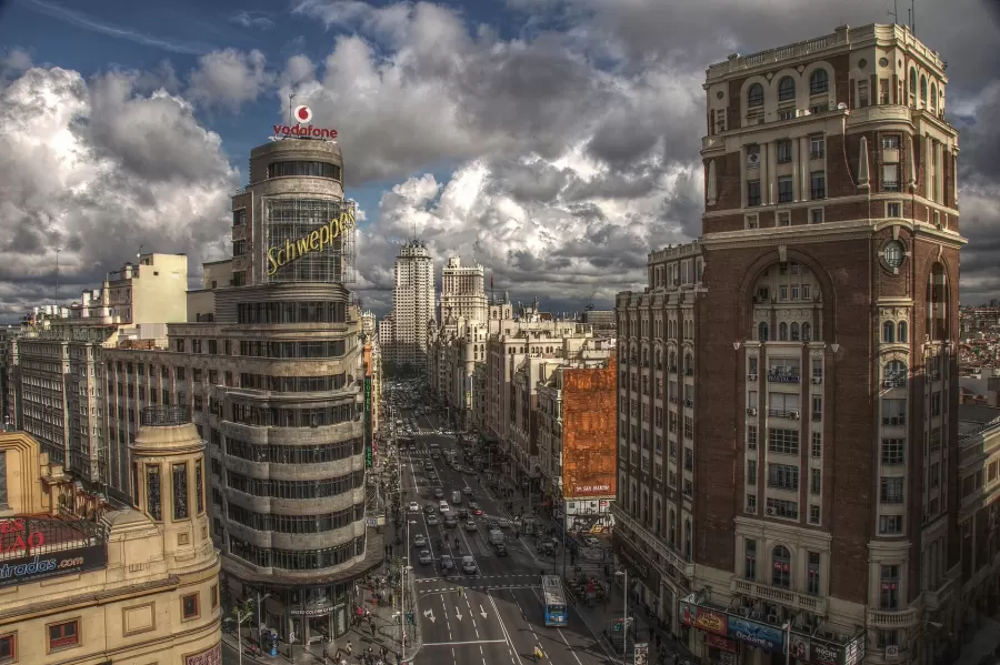 Gran Vía seen from above, with the Carrión building and traffic heading towards Plaza de Callao in Madrid