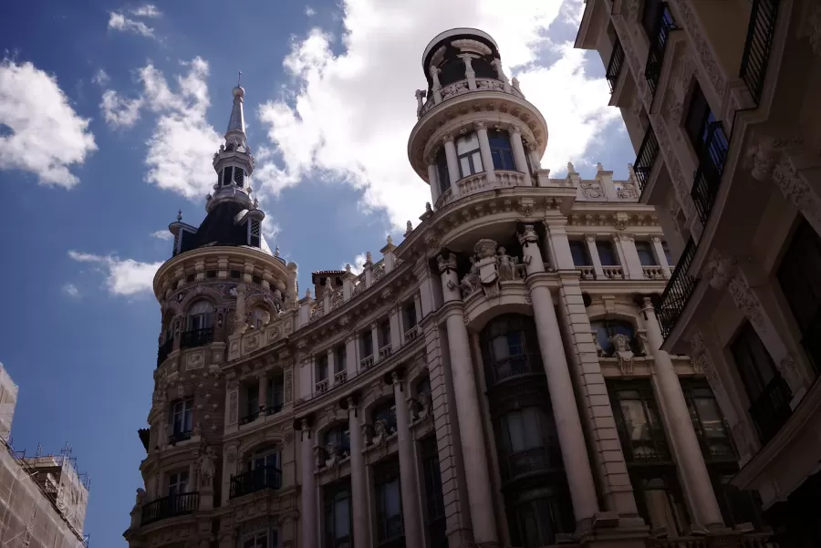 Ornate early twentieth-century building with a corner dome in central Madrid