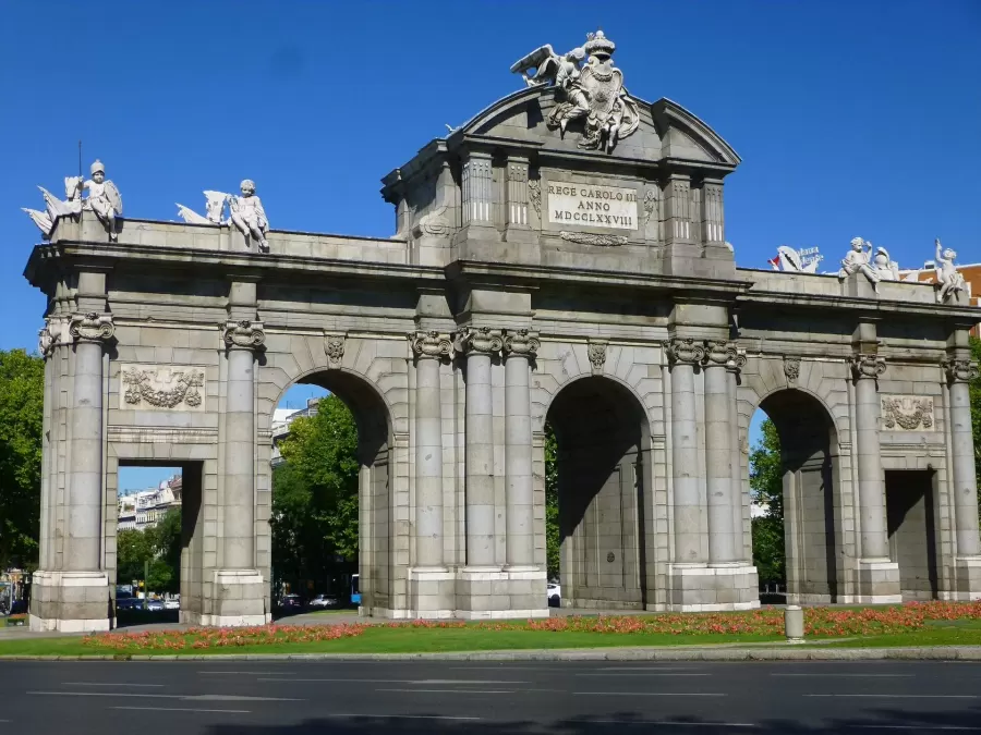 The Puerta de Alcalá monument at Plaza de la Independencia in Madrid on a sunny day