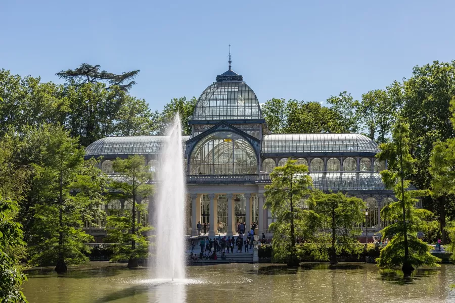 The Crystal Palace in El Retiro Park, Madrid, with its pond and fountain
